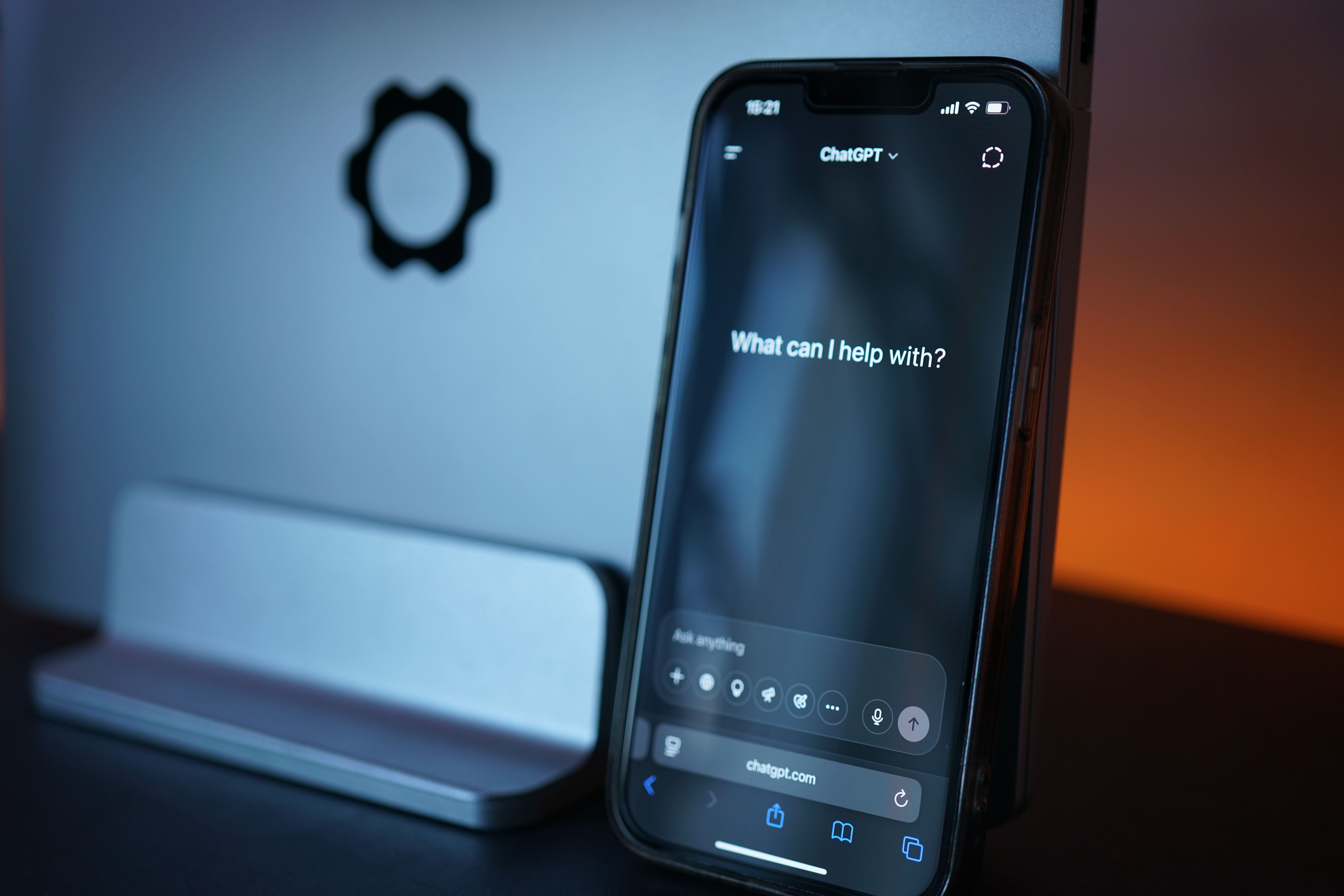 Close-up of a smartphone displaying an AI chat interface with gardening questions